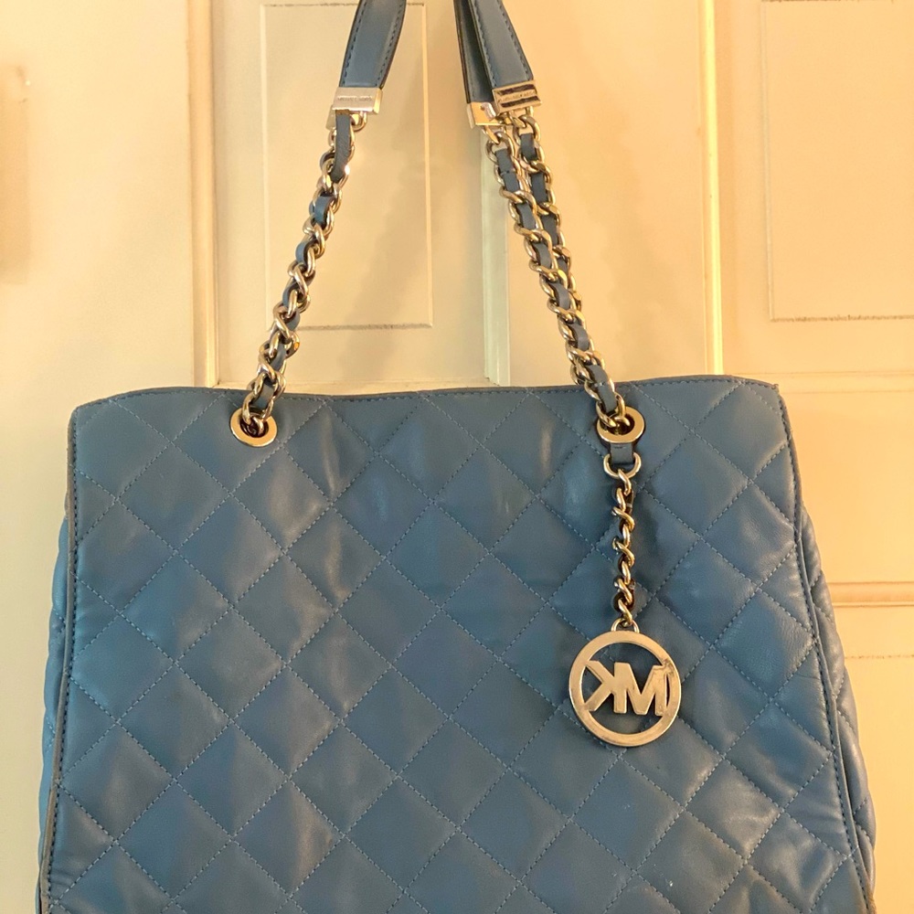 Micheal Kors sky blue purse.